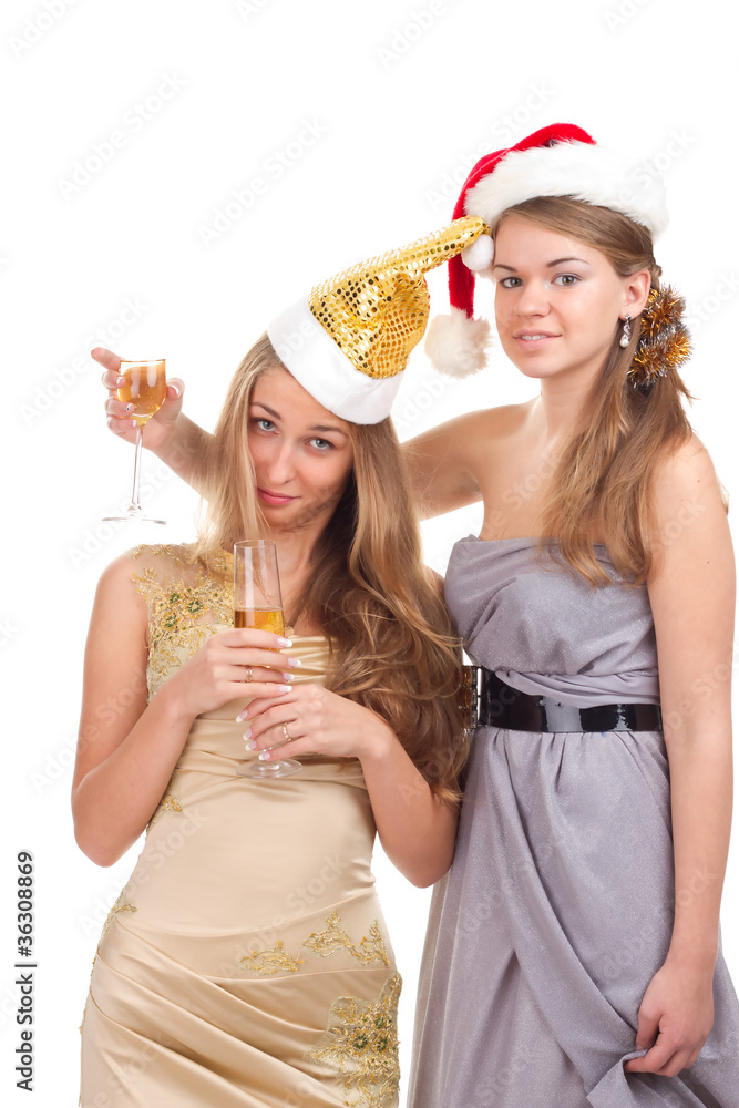 Two girls celebrate Christmas with gifts and glasses Two girls celebrate Christmas with gifts and glasses