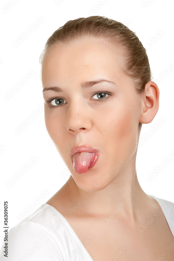 portrait of attractive smile teenage girl, show her tongue portrait of attractive smile teenage girl, show her tongue