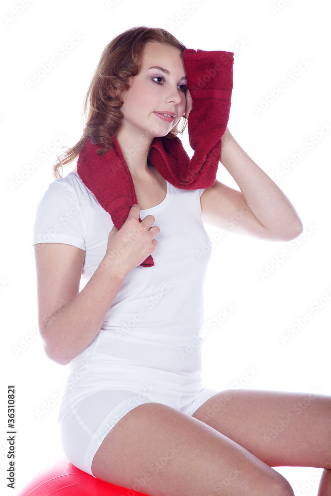 Sportliche Frau mit Handtuch und Medizin Ball Porträt Sportliche Frau mit Handtuch und Medizin Ball Porträt