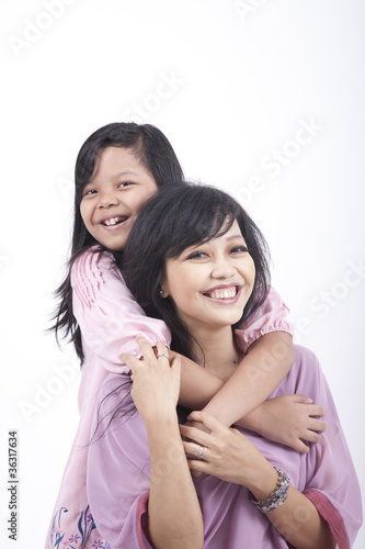 Mother and Daughter Hugging