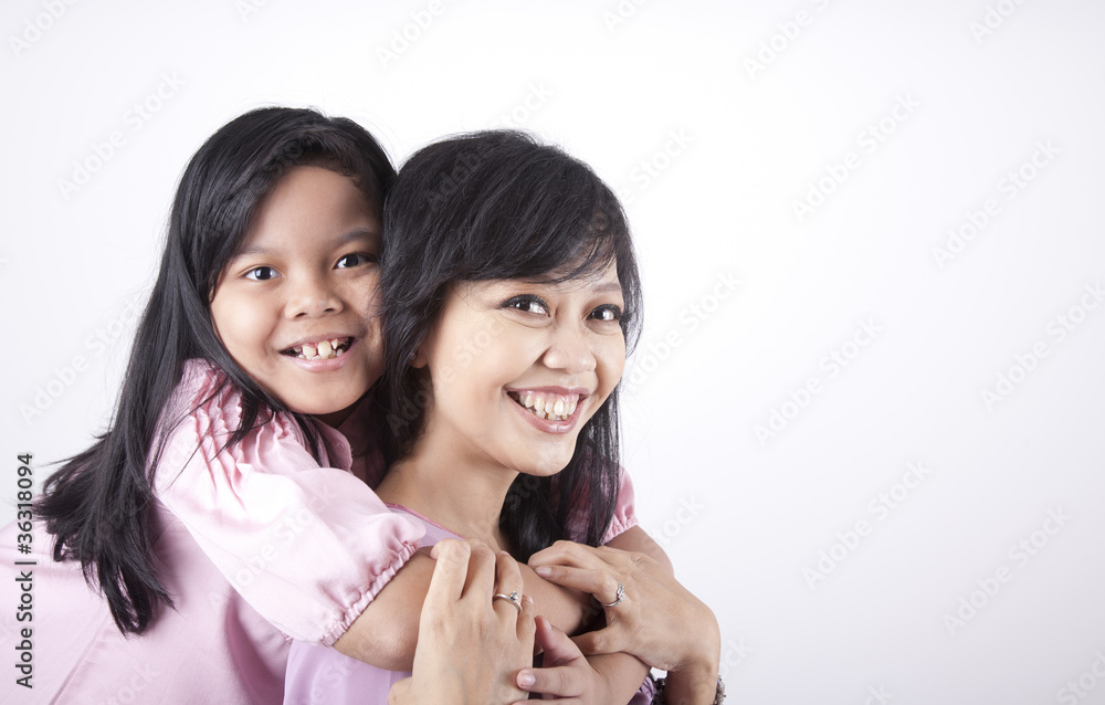 Happy Pose of Mother and Daughter Happy Pose of Mother and Daughter