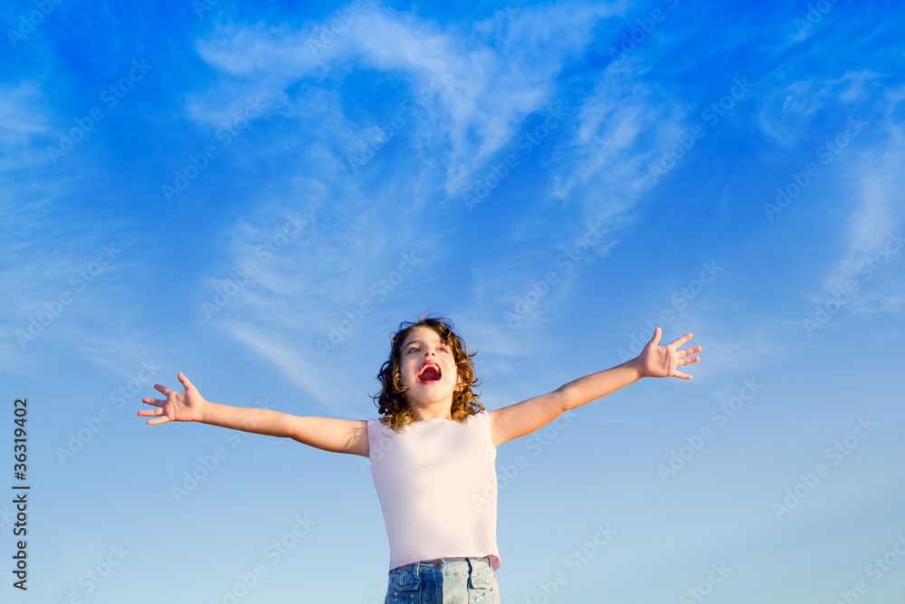 Girl open arms outdoor under blue sky Girl open arms outdoor under blue sky