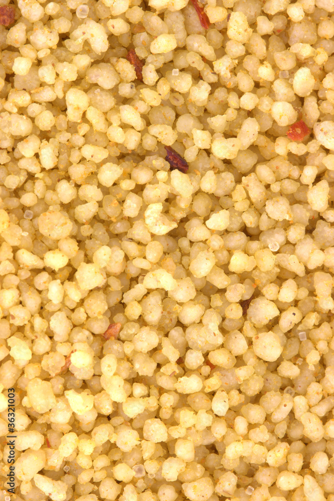 Brown bowl with couscous on white background Brown bowl with couscous on white background