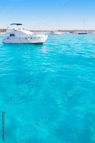 Anchored motorboats in Formentera Illetes