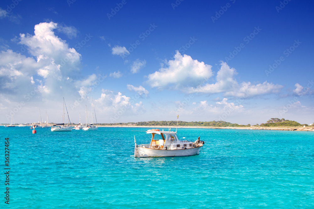 llaut white boat in Formentera Illetes near Ibiza