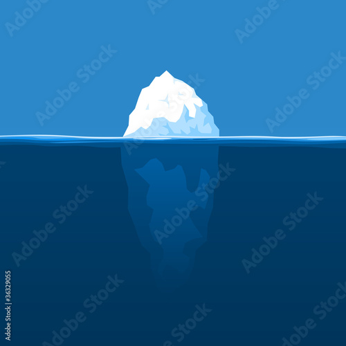 The white iceberg floats at ocean