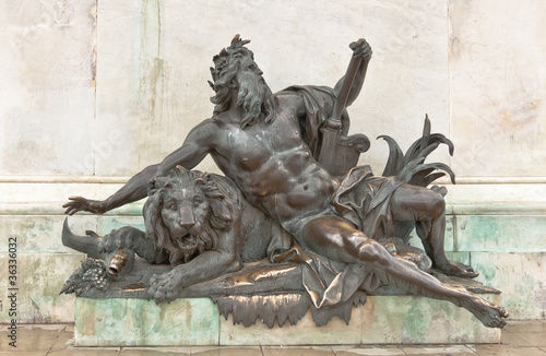 Men with lion sculpture of the Place Bellecour, Lyon, France