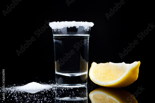 tequila shot, with lemon and salt photo
