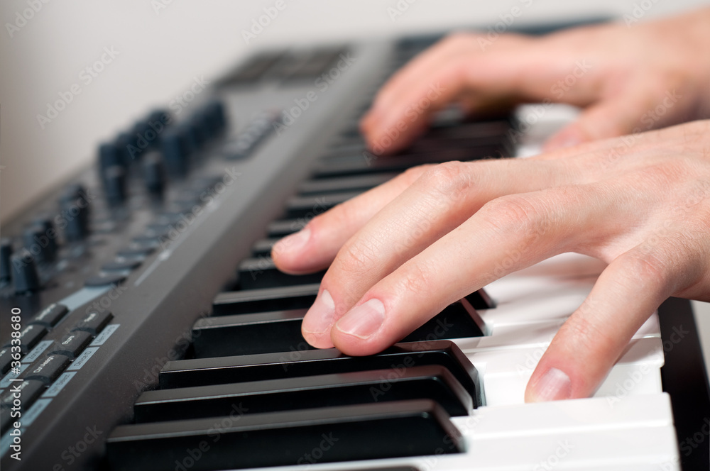 Fototapeta premium man playing piano