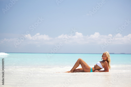 woman on the sand the ocean coast © yellowj