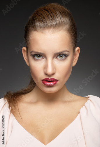 Close-up portrait of sexy caucasian young woman with beautiful r