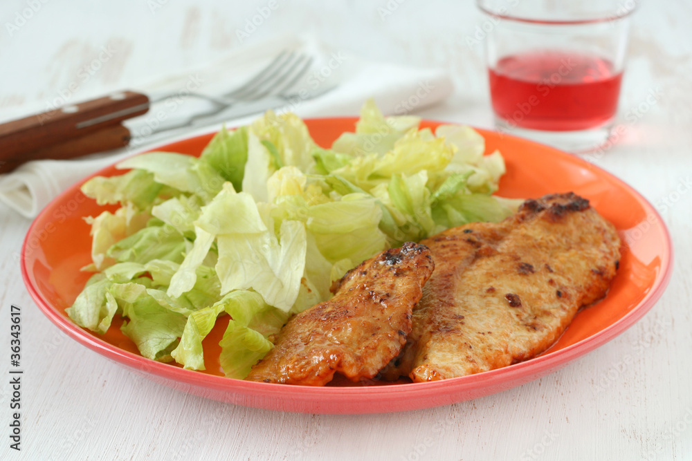 Fried turkey with salad Fried turkey with salad