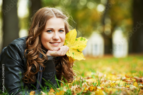 Woman at autumn outdoors