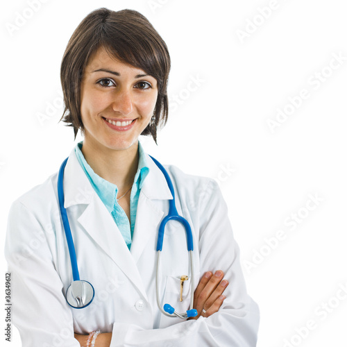 Friendly female doctor portrait. Isolated on white.