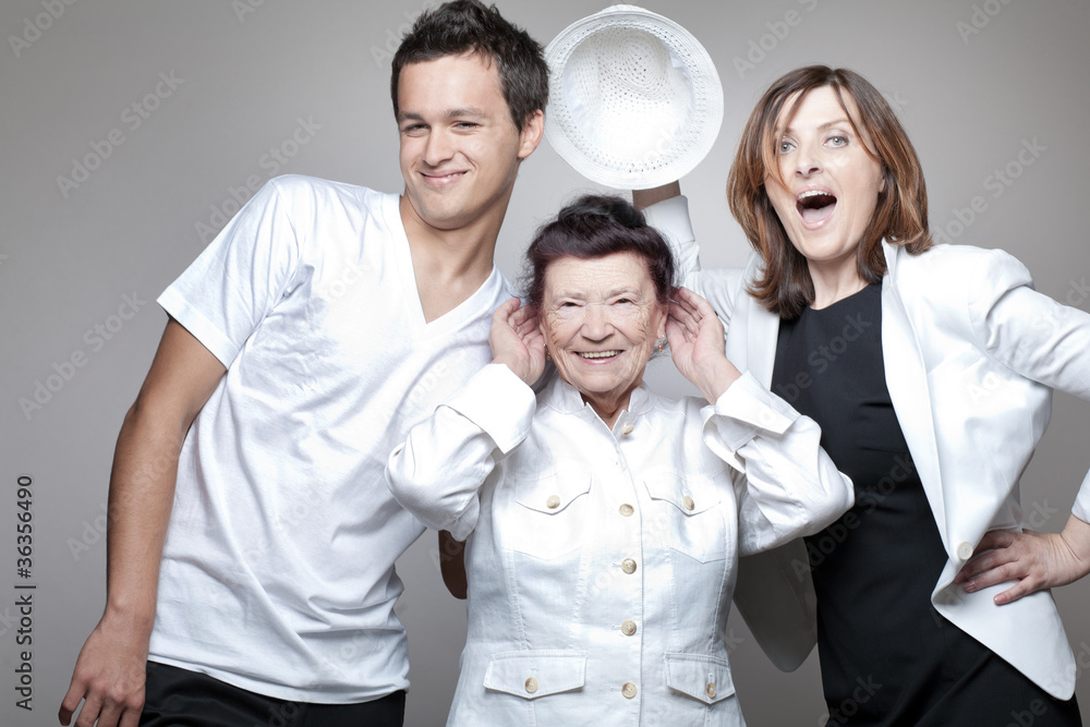 Grandmother with adult daughter and grandson. Grandmother with adult daughter and grandson.