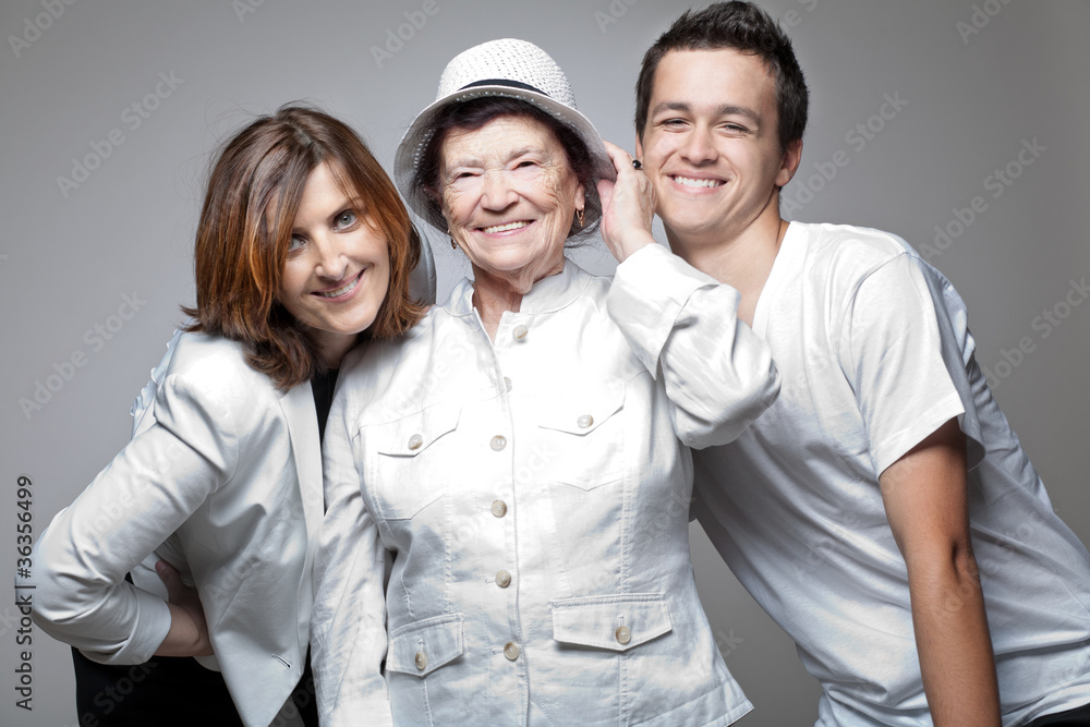 Grandmother with adult daughter and grandson. Grandmother with adult daughter and grandson.