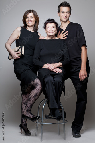 Grandmother with adult daughter and grandson.