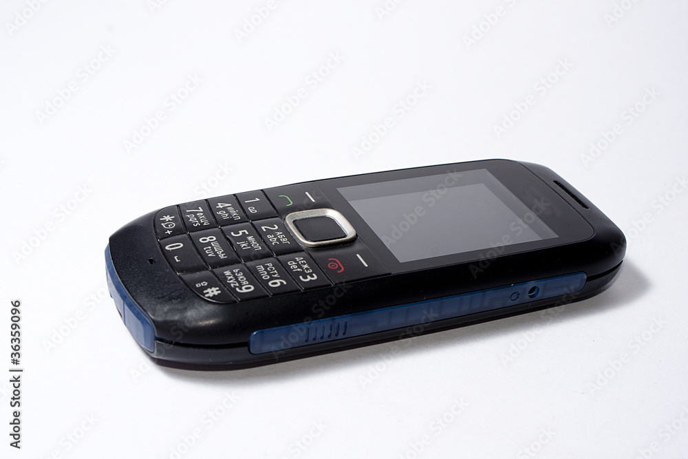One black mobile phone with the white screen on white background One black mobile phone with the white screen on white background