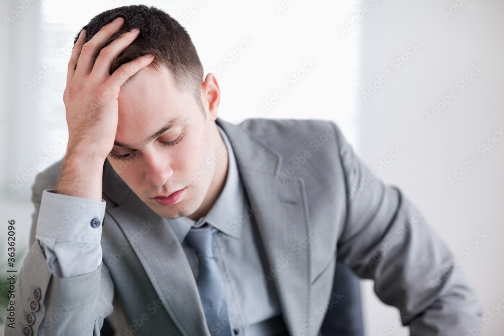 Close up of businessman after getting bad news Close up of businessman after getting bad news