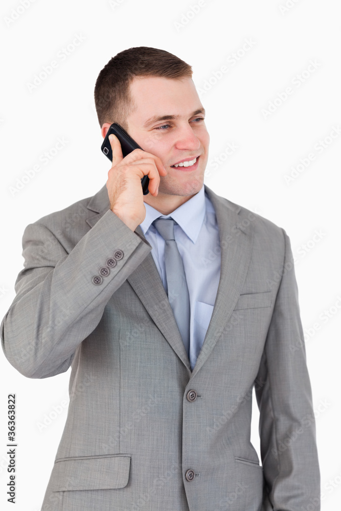 Close up of young businessman on the phone Close up of young businessman on the phone