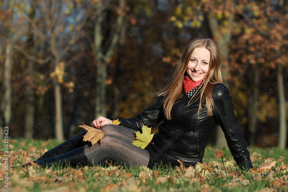 Beautiful young woman in autumn park Beautiful young woman in autumn park