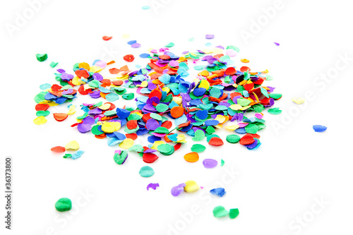 pile of colorful confetti over white background