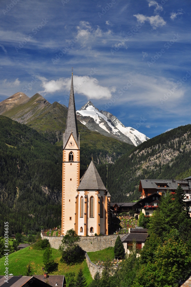 Heiligenblut church in front of Grossglockner peak, Austria