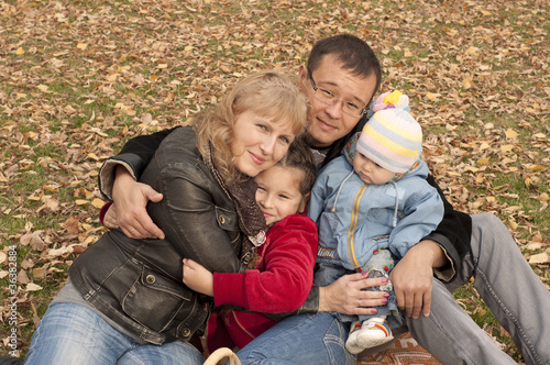Young family in autumn park