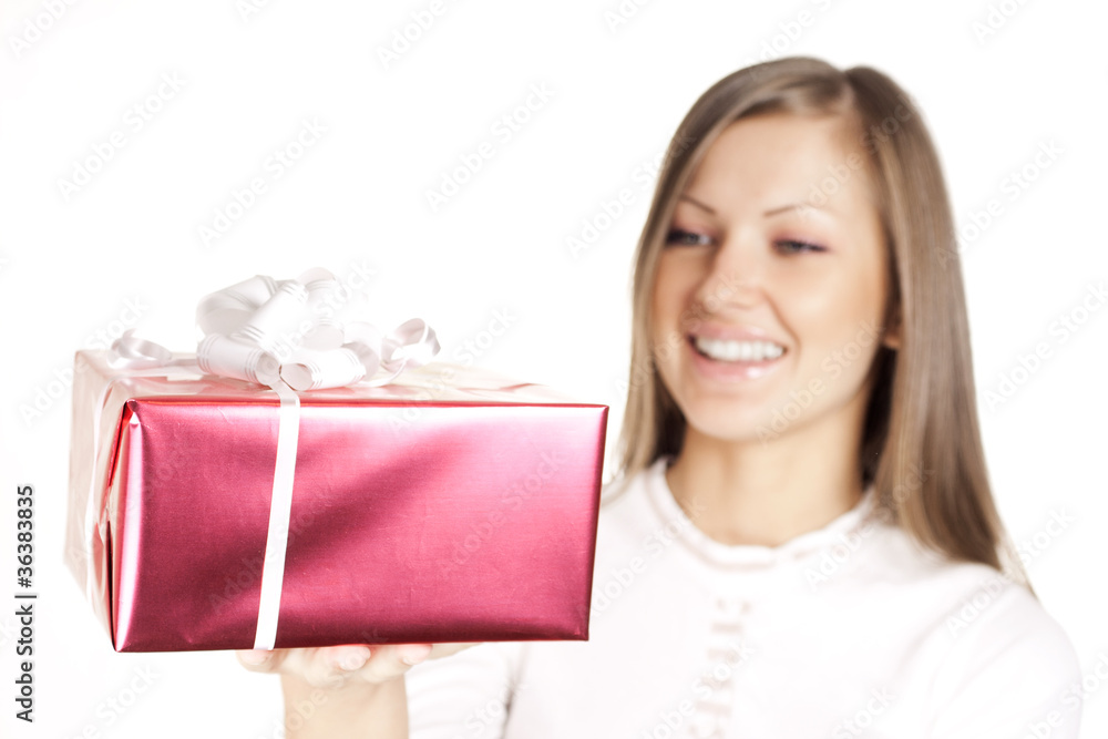 beautiful young smiling woman holding christmas gift beautiful young smiling woman holding christmas gift