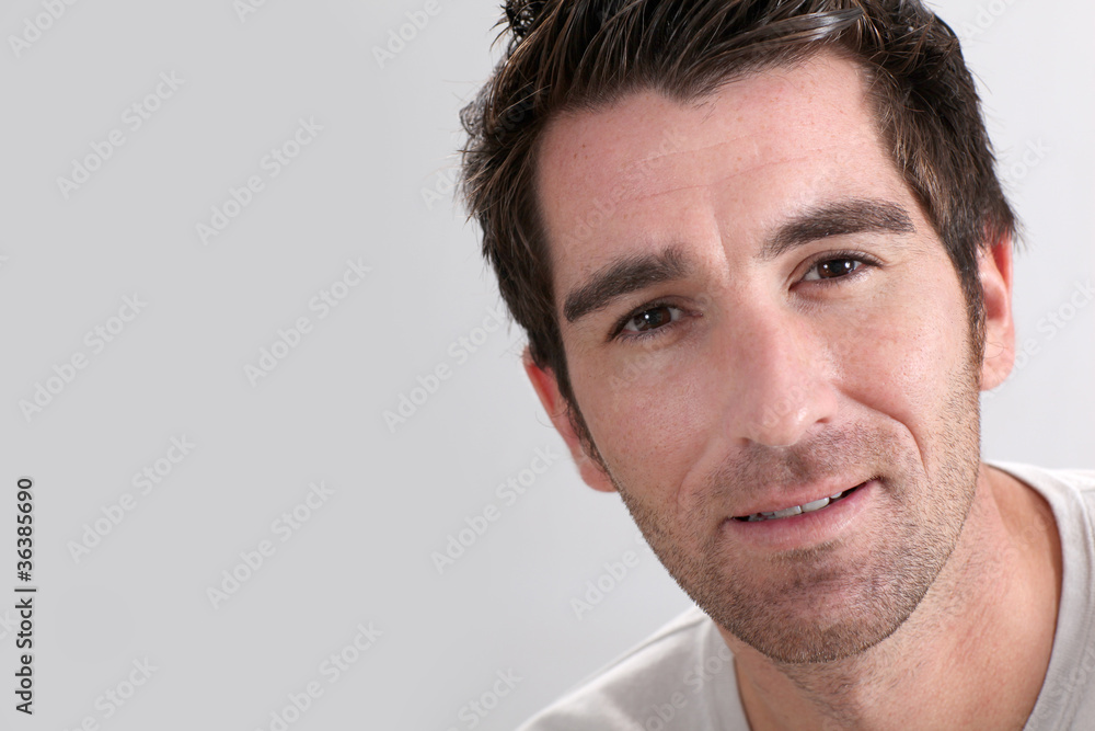 Fototapeta premium Portrait of man on white background