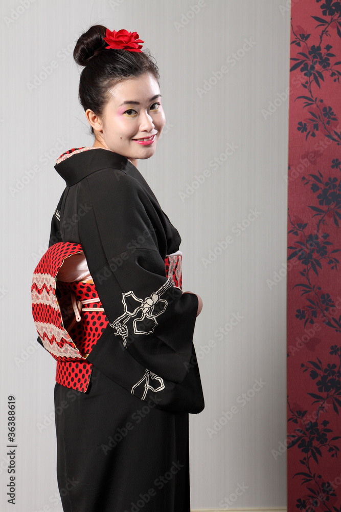 Back view Japanese kimono on happy Asian model