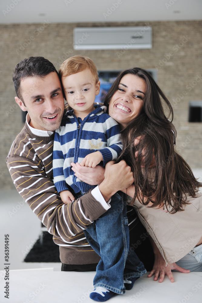 happy young family have fun at home happy young family have fun at home