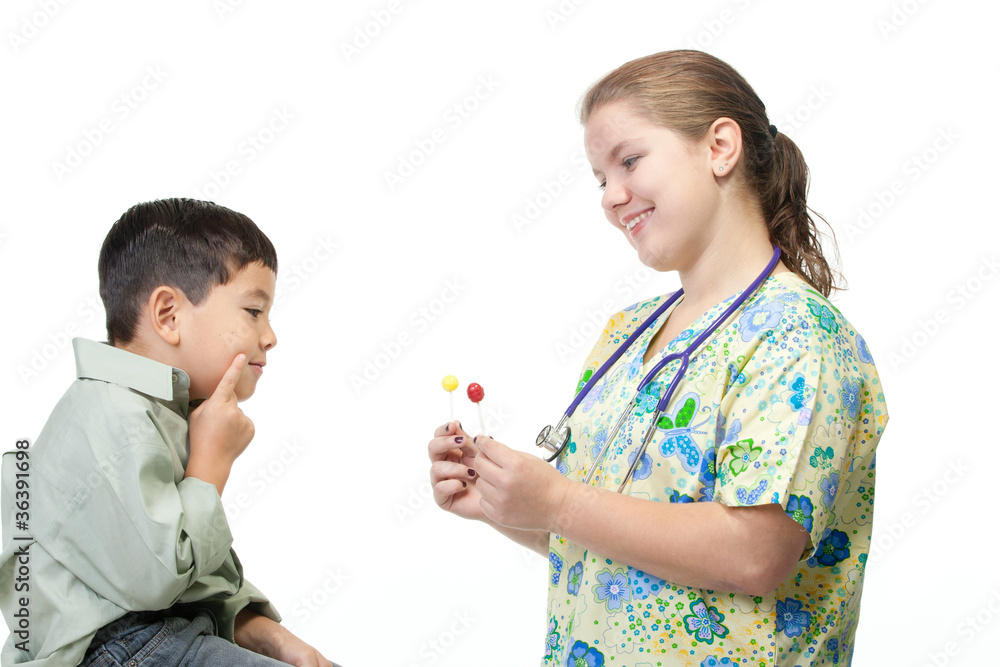 Nurse gives boy a choice of candy. Nurse gives boy a choice of candy.