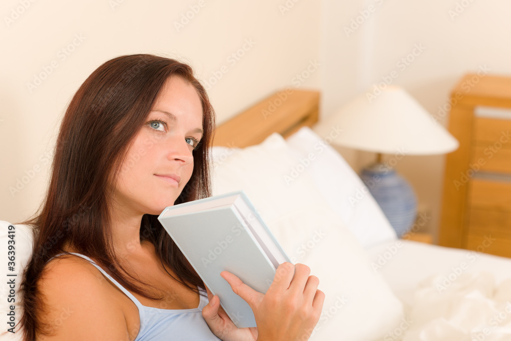 Bedroom thoughtful woman read book in bed Bedroom thoughtful woman read book in bed