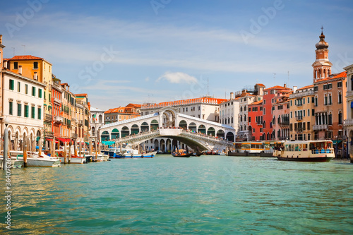 Rialto Bridge over Grand canal in Venice photo