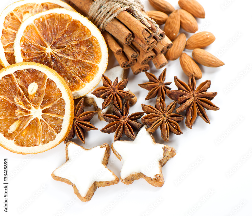 cinnamon sticks, anise stars and sliced of dried orange cinnamon sticks, anise stars and sliced of dried orange