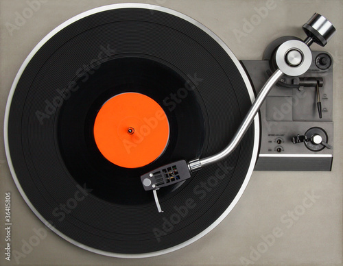 Record player with vinyl record