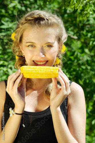 woman eating corn-cob