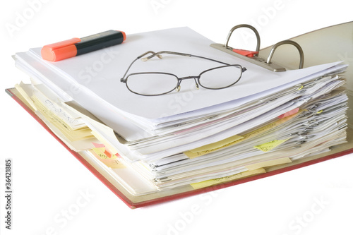 open file folder with spectacles and text marker