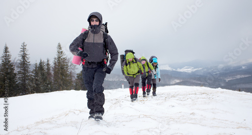 Hiker in winter mountains