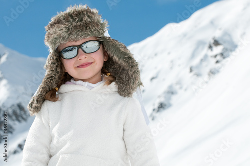 Winter vacation - portrait of cute winter girl