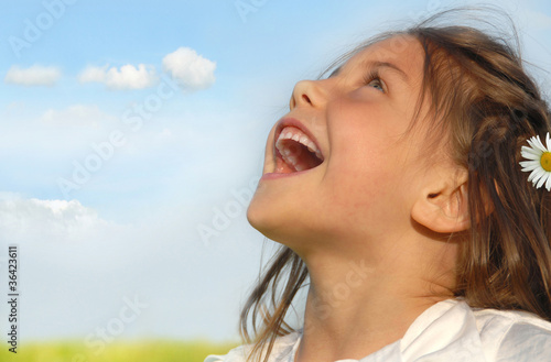 Little girl singing  outside