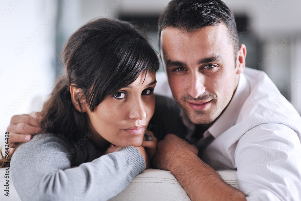 Obraz premium happy young couple relax at home