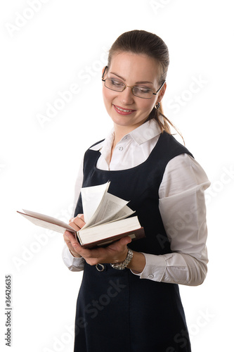 Young woman reading book isolated on white