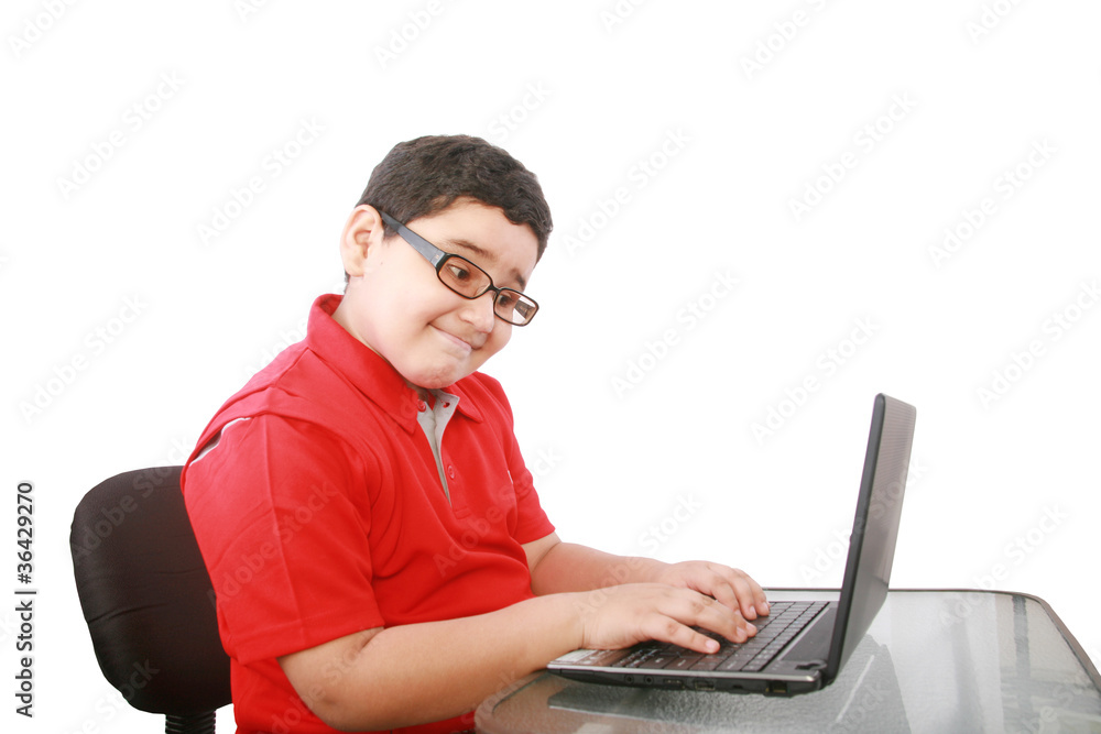 young boy with computer isolated on white young boy with computer isolated on white
