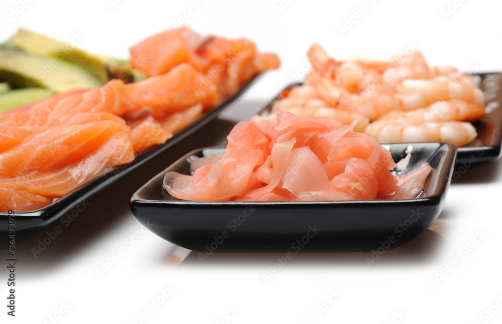 ingredients for sushi making. salmon, cucumber, avocado, shrimps ingredients for sushi making. salmon, cucumber, avocado, shrimps