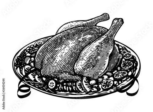 whole roasted turkey on  decorated platter with garnish