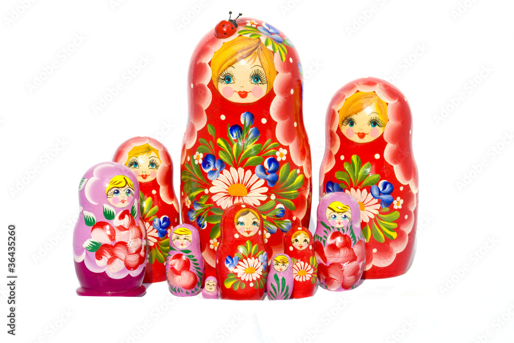 Red and violet Babushkas on white Red and violet Babushkas on white