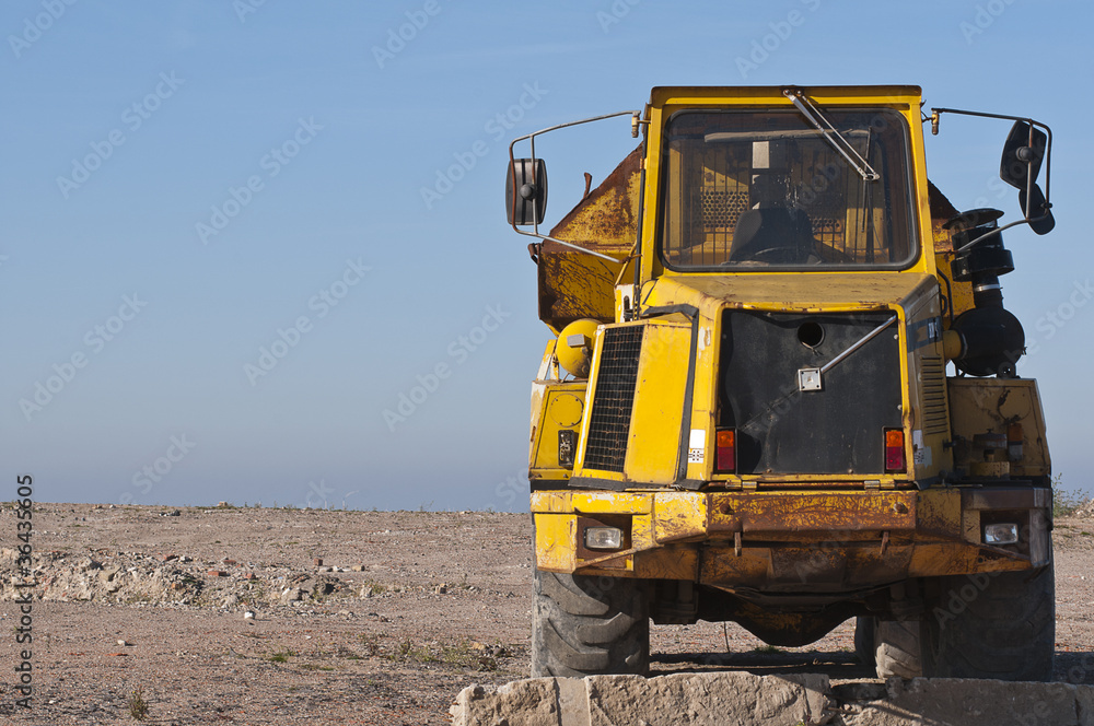 Front view of a yellow Dump truck Front view of a yellow Dump truck