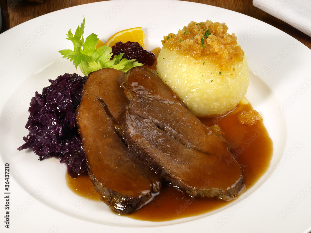 Wildschweinbraten mit Rotkohl Stock Photo | Adobe Stock